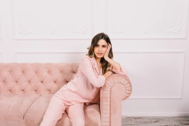 adorable-woman-pajama-sitting-sofa